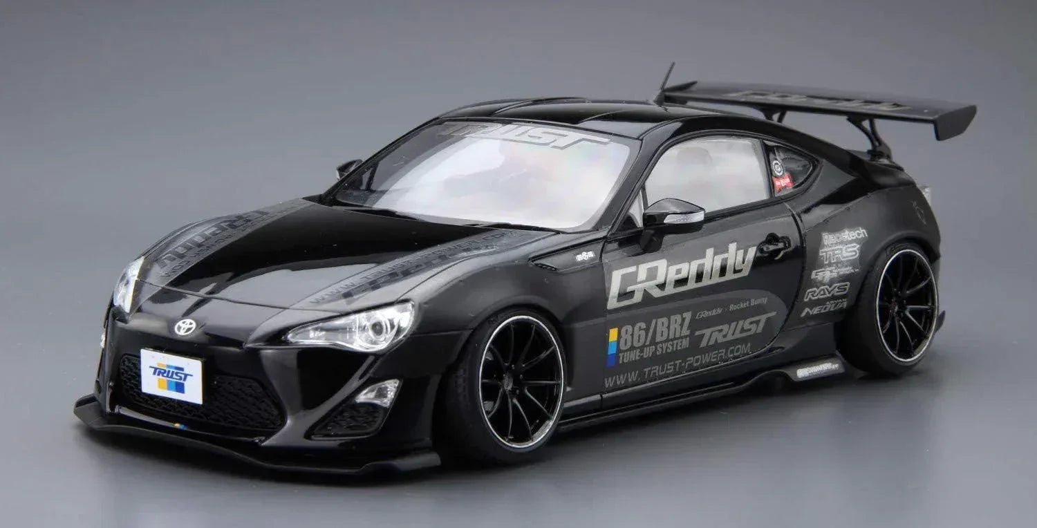 Aoshima 06187 Toyota 1986 12 Greddy & Rocket Bunny Volk Racing Ver. 1/24 Model Kit - A-Z Toy Hobby